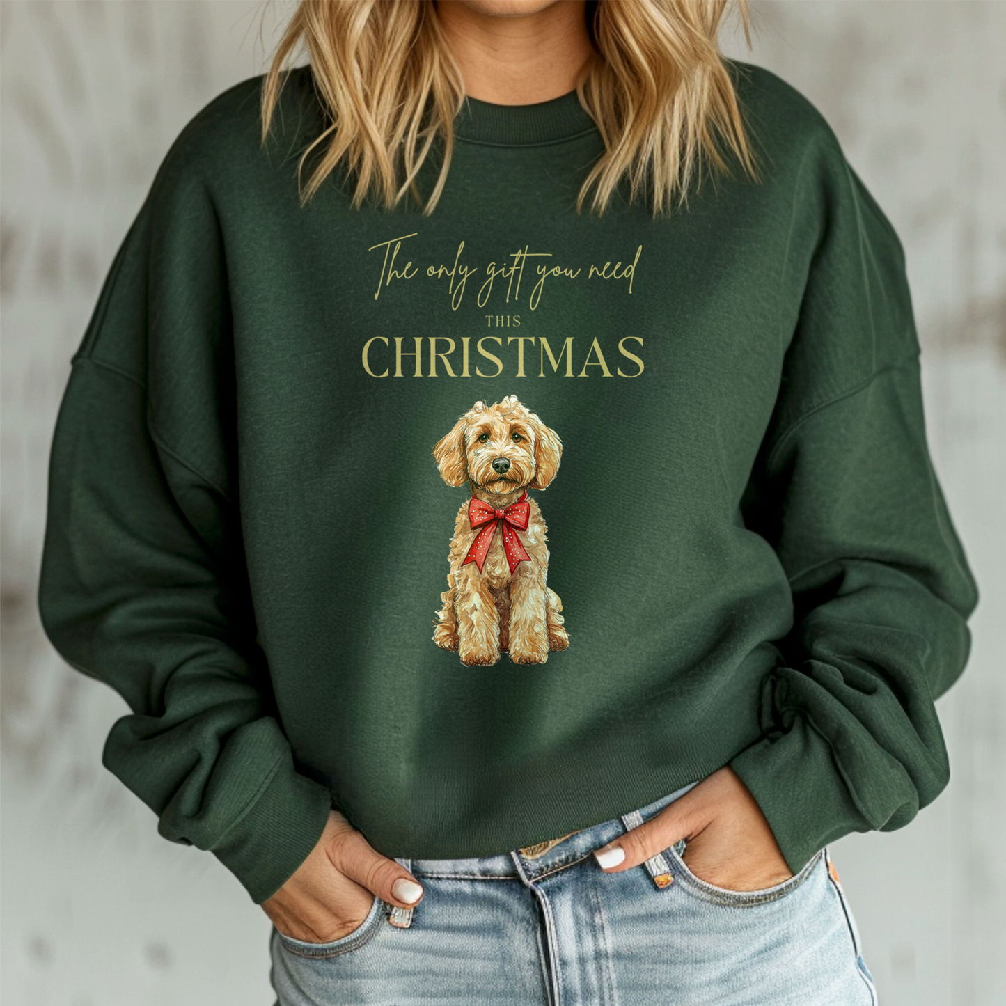 Person wearing a green sweatshirt with a dog illustration and text
