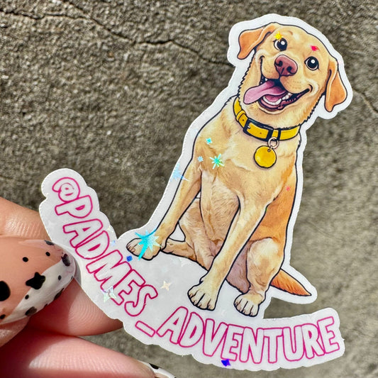 Sticker of a dog with 'Pades Adventure' text on a textured surface