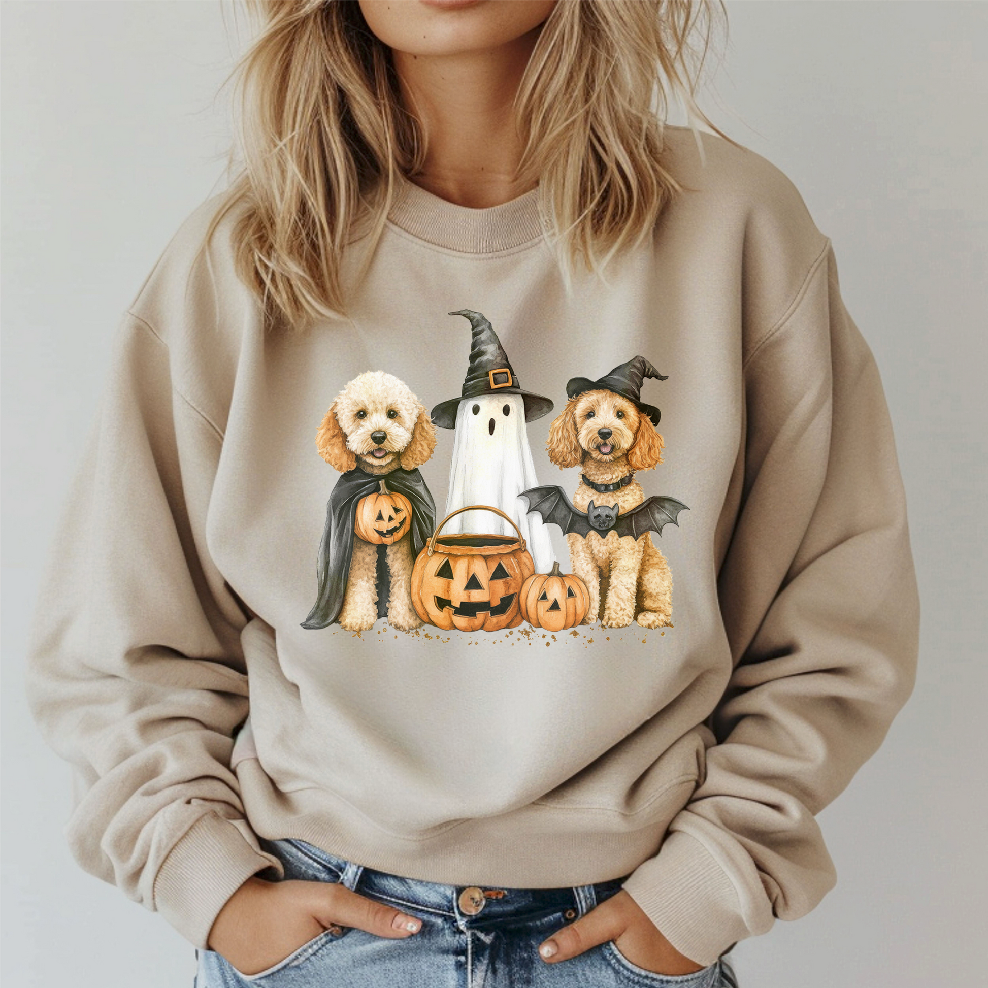 Spooky Doodle Sweatshirt featuring playful doodle dogs in Halloween costumes with pumpkins.
