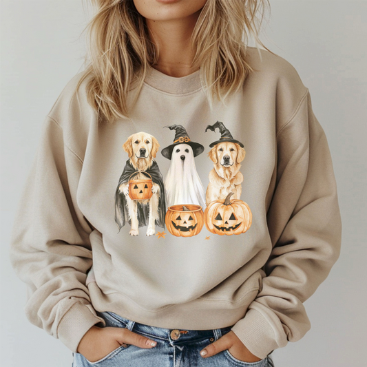 Beige sweatshirt with Halloween-themed dog graphics worn by a person.